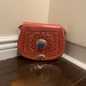 Pink bag with blue stone details